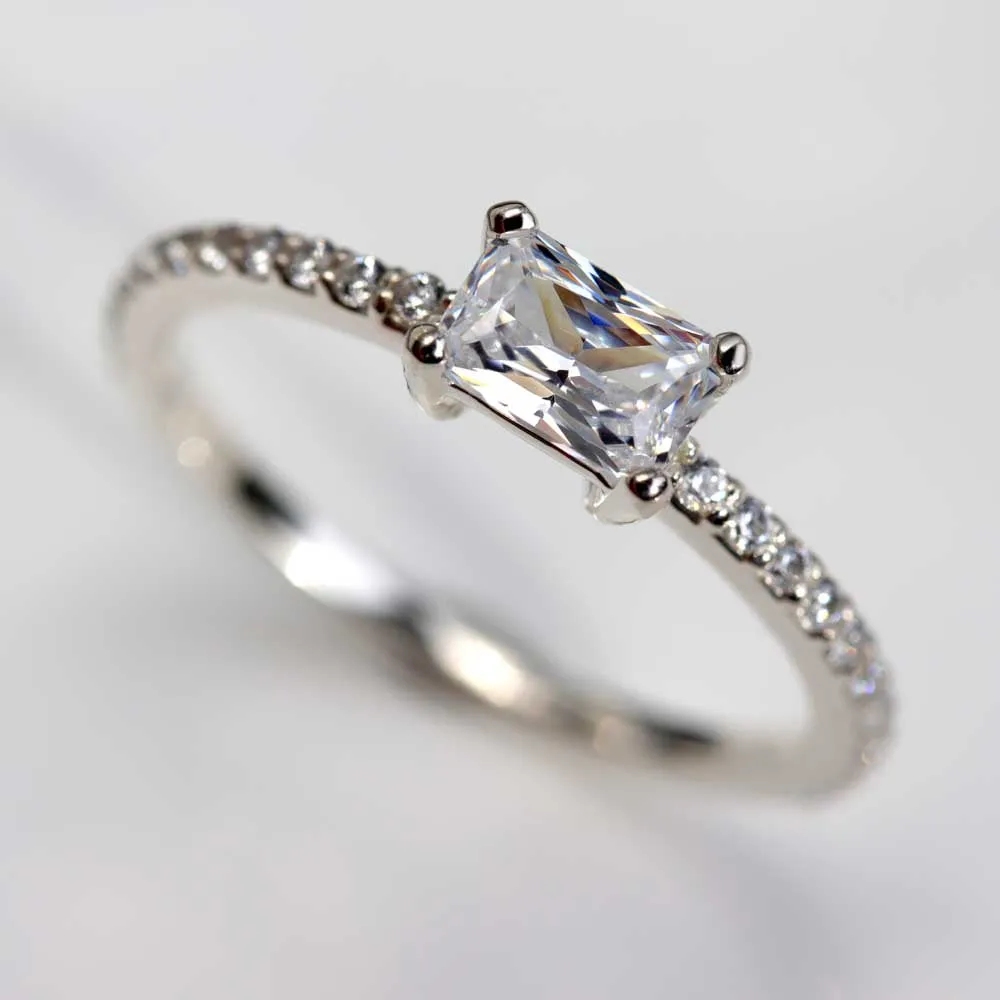Emerald Cut East-West Basket Pave Engagement Ring