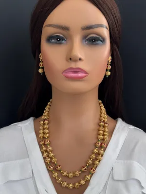 Long gold plated Matar Mala Necklace on Red