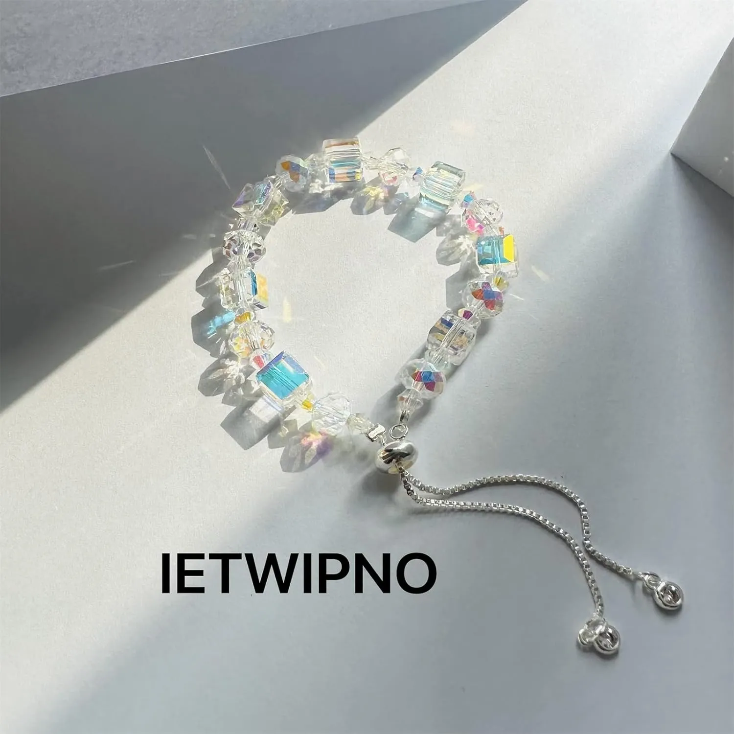 New Designed Iridescent Crystal Beaded Bracelet with Dangling Charms And Women's Gifts.The Sugar Austrian Crstal Bracelet is a Delicate Gorgeous Bracelet for Lady With Adjustable Elasticity