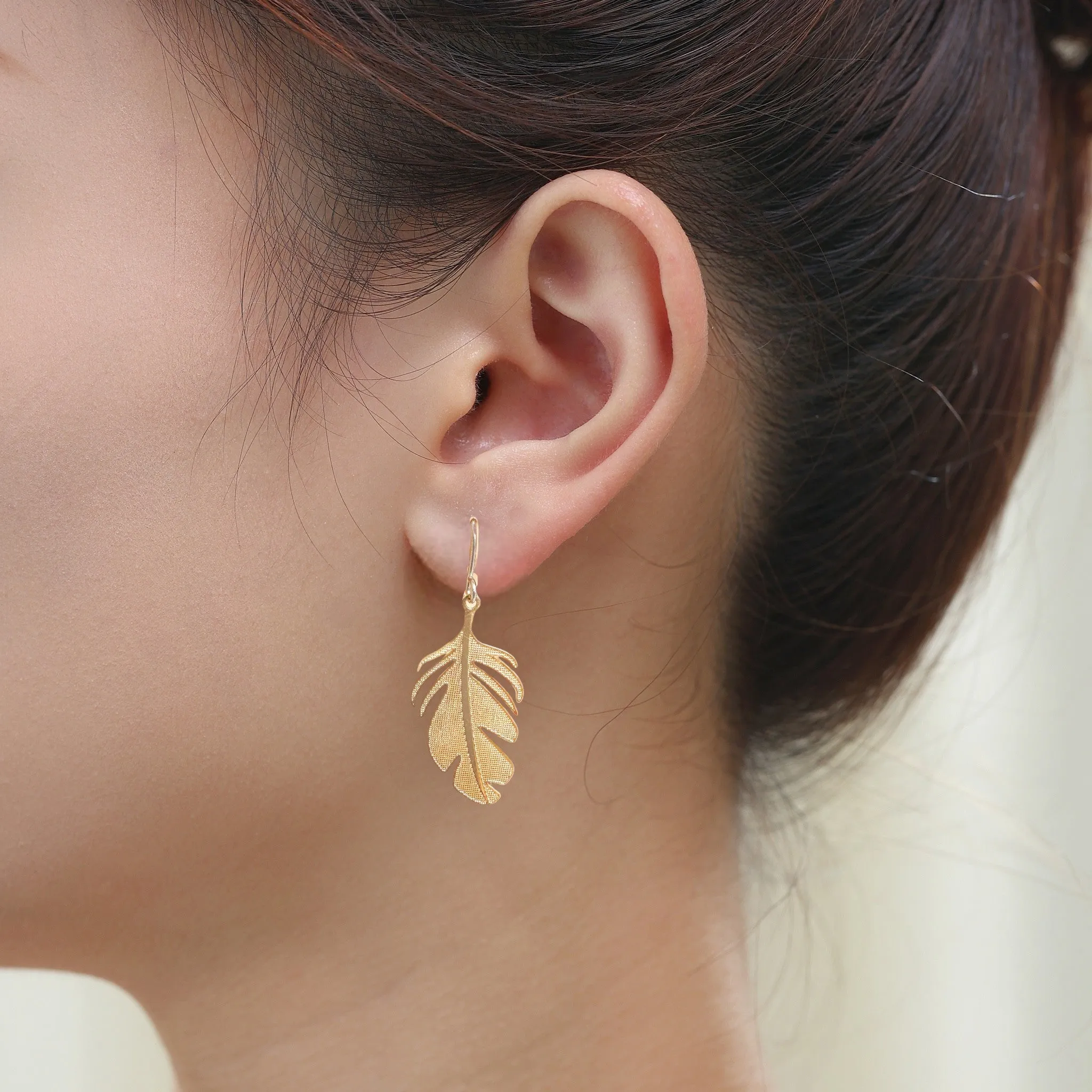 Stylized monstera leaf earring
